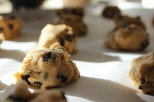 Cookie dough on cooking sheet 